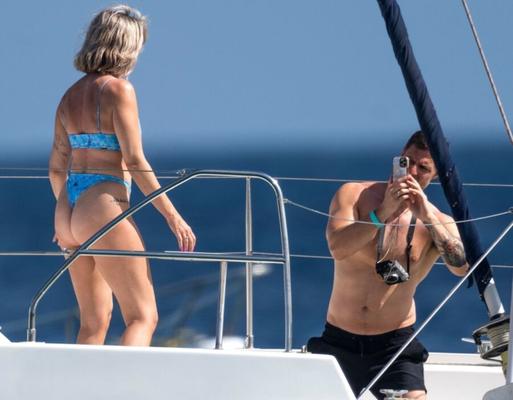 Sarah Jayne Dunn in blue thong-bikini during holiday in Barbados