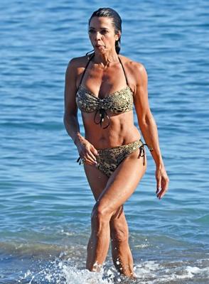 Jenny Powell in bikini in Spain //