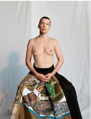 Milla Jovovich loves being topless