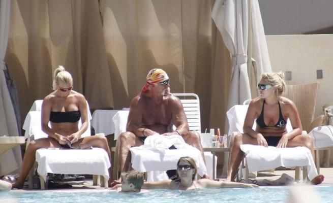 HULK HOGAN ENJOYS A DAY AT THE POOL WITH HIS SEXY DAUGHTER BROOK