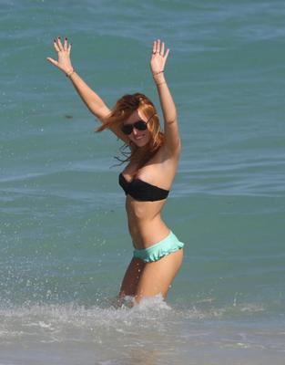 Bella Thorne Falling Out of Her Tiny Bikini