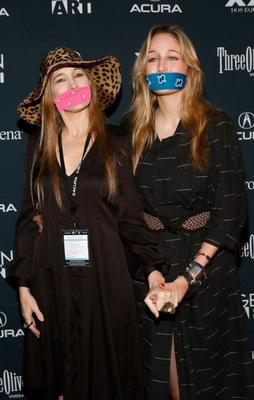 Elizabeth Sobieski and Leelee Sobieski Gagged