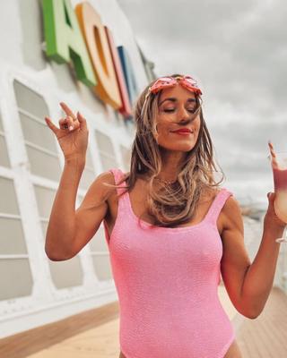 Annemarie Carpendale in a sexy pink swimsuit