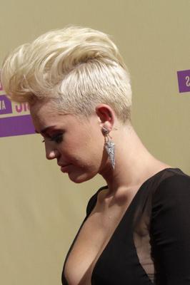 Miley Cyrus great tits and buzzed head