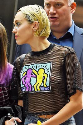 Miley Cyrus see through shirt in public