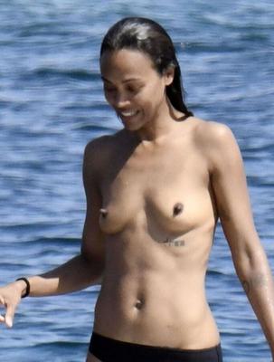 Zoe Saldana Topless in bikini bottomw with wet tits