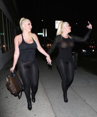 Two hot blonde in black pantyhose