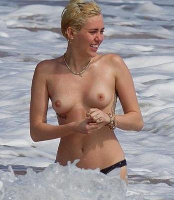 Miley Cyrus At The Beach