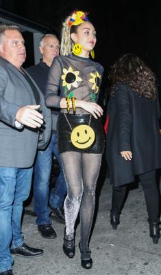 Miley Cyrus collants brillants sexy