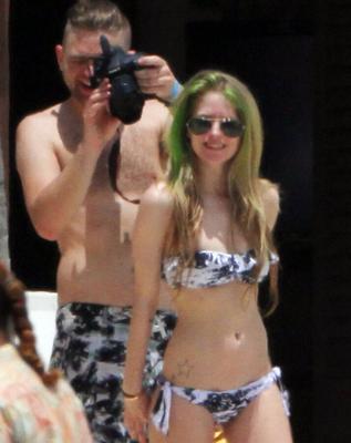 Avril Lavigne at the beach