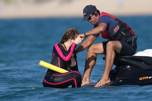 Mariah Carey - Nipslip in a wetsuit in Italy