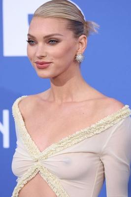 ELSA HOSK FLAUNTS NIPPLES IN SEE THROUGH DRESS