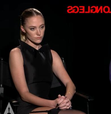 Maika Monroe shows stocking top and garter in Longlegs interview