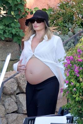 Margot Robbie showing baby bump on vacation in Sardinia 